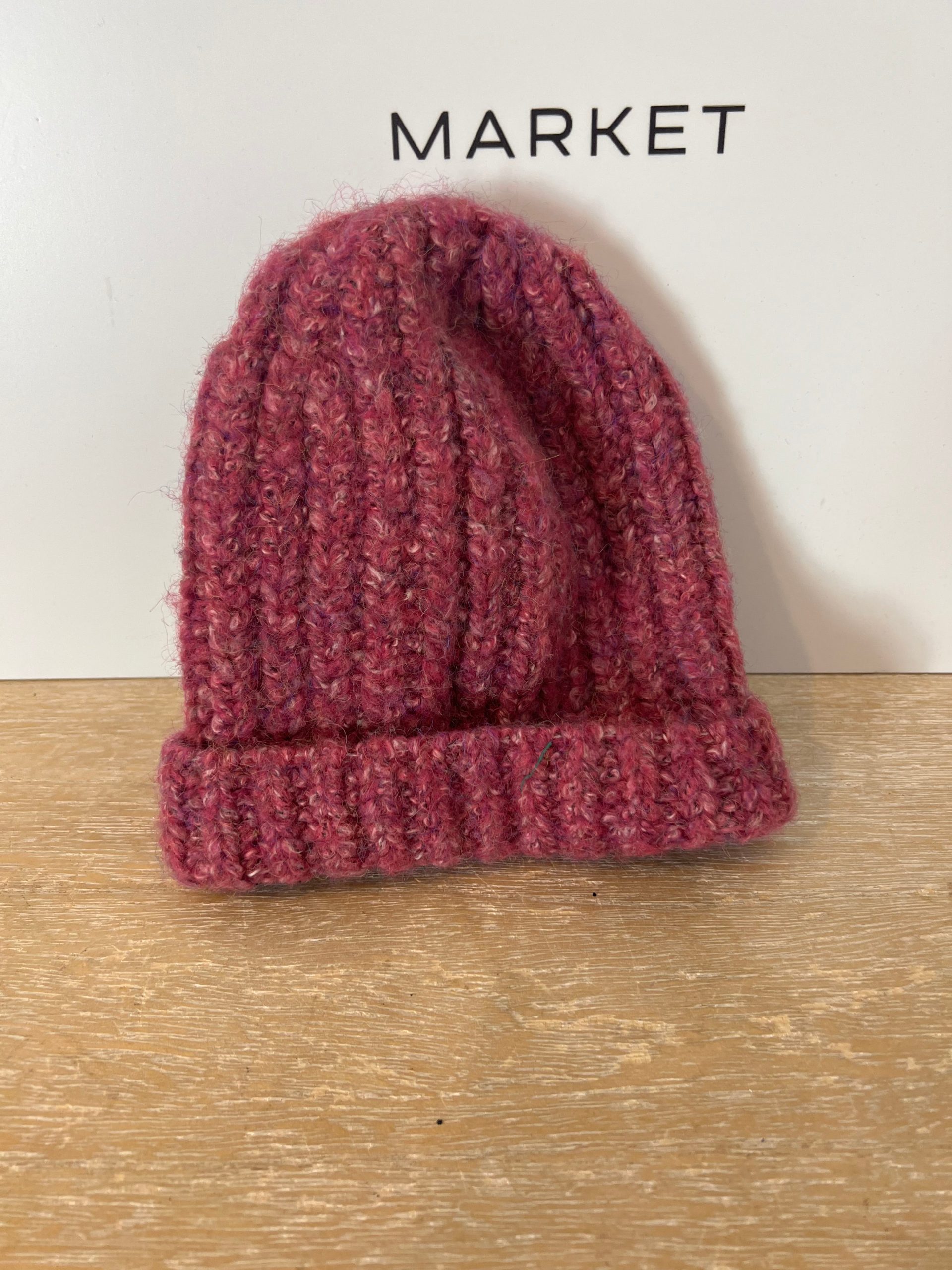 OTRAS. Gorro rosa jaspeado