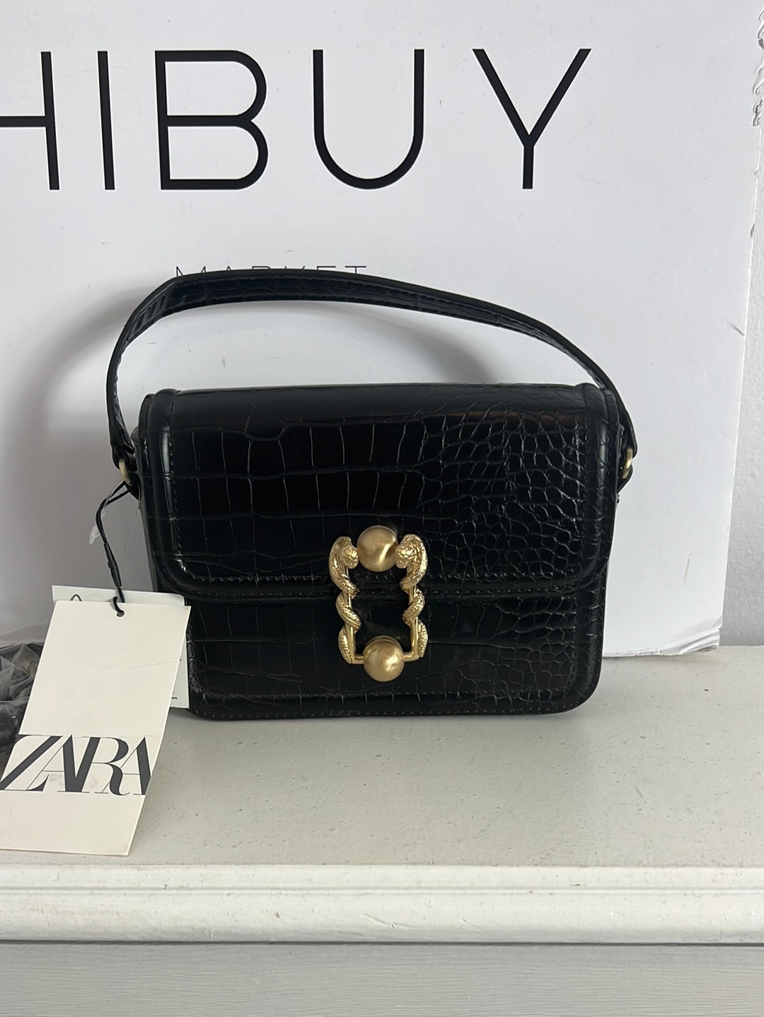ZARA. Bolso mini cierre dorado