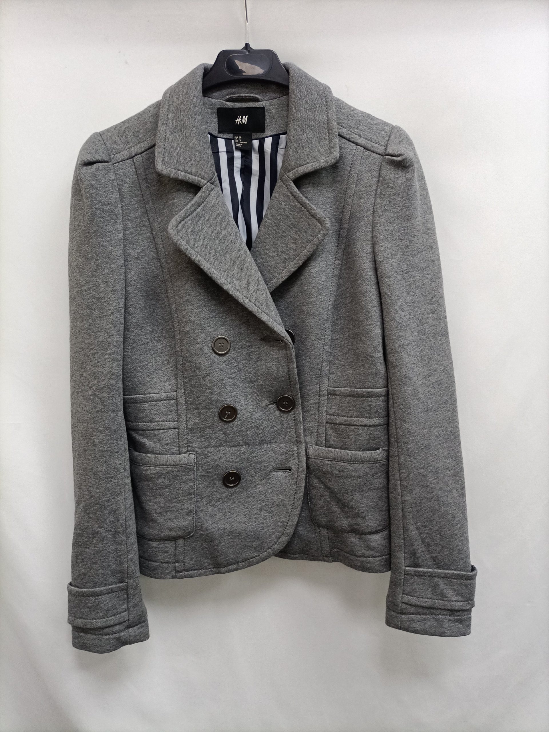 H&M. blazer gris punto  T.38