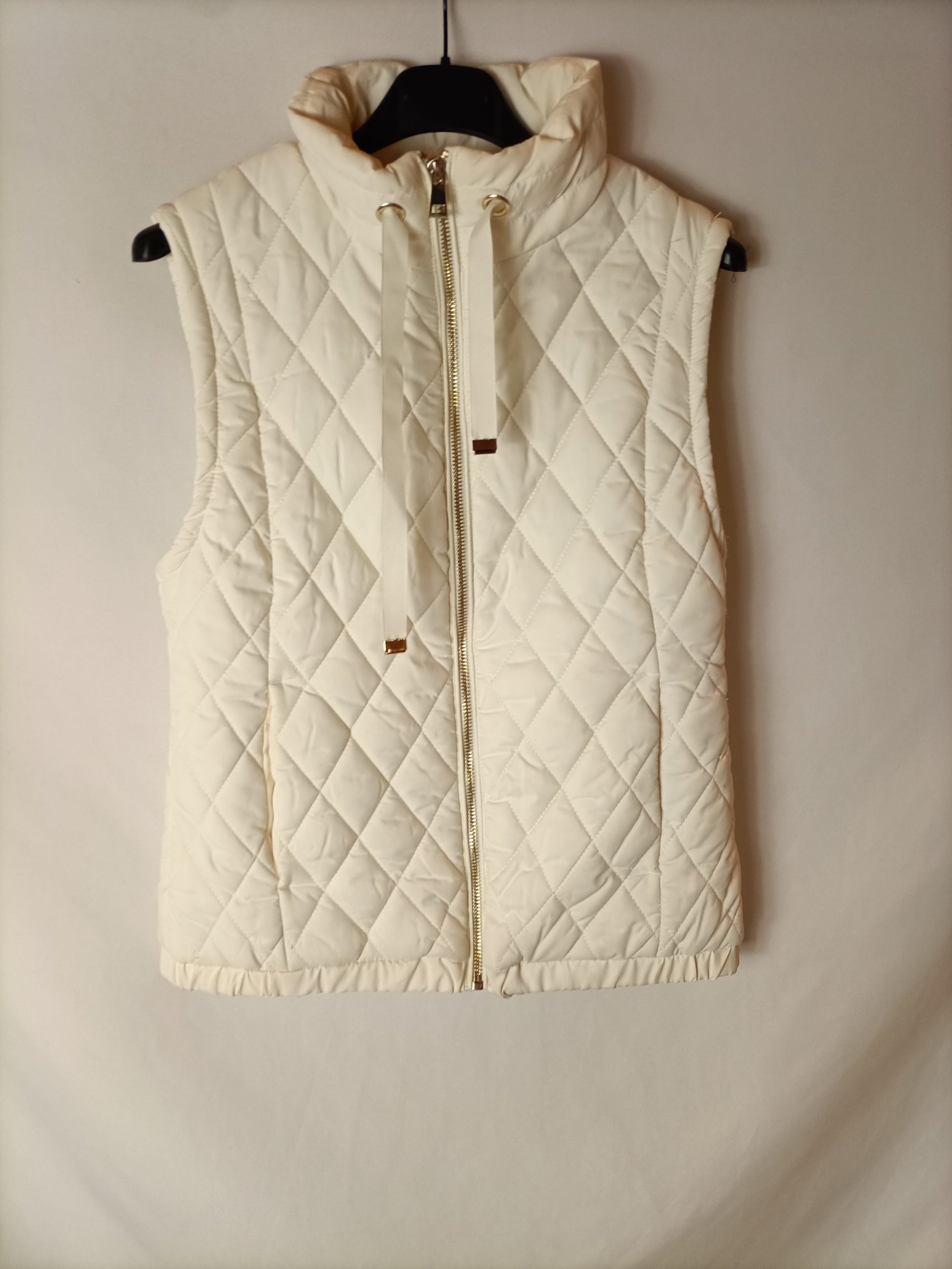 SFERA. Chaleco acolchado beige. T S