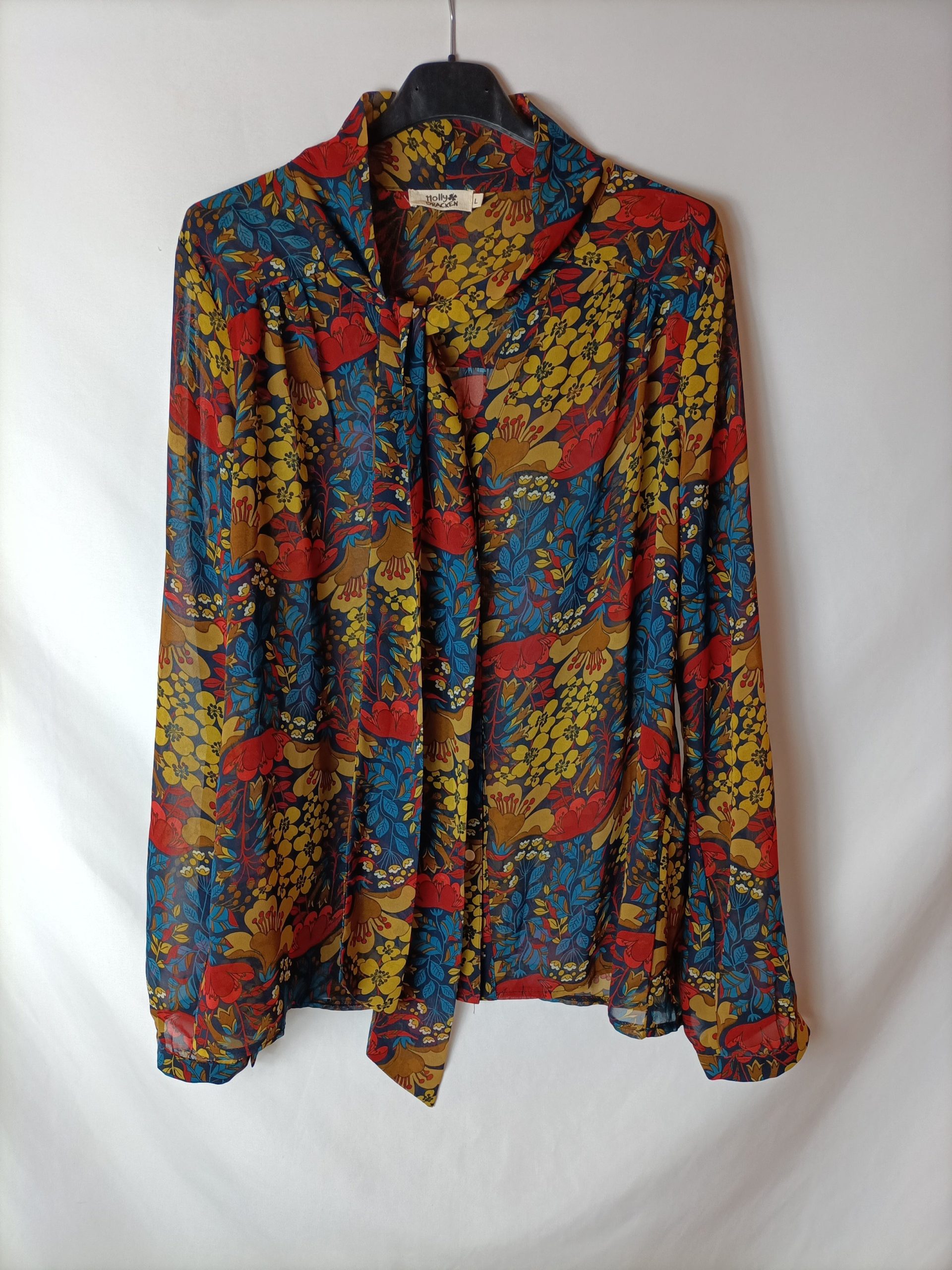 MOLLY BRACKEN. Blusa semitransparente estampada. T L