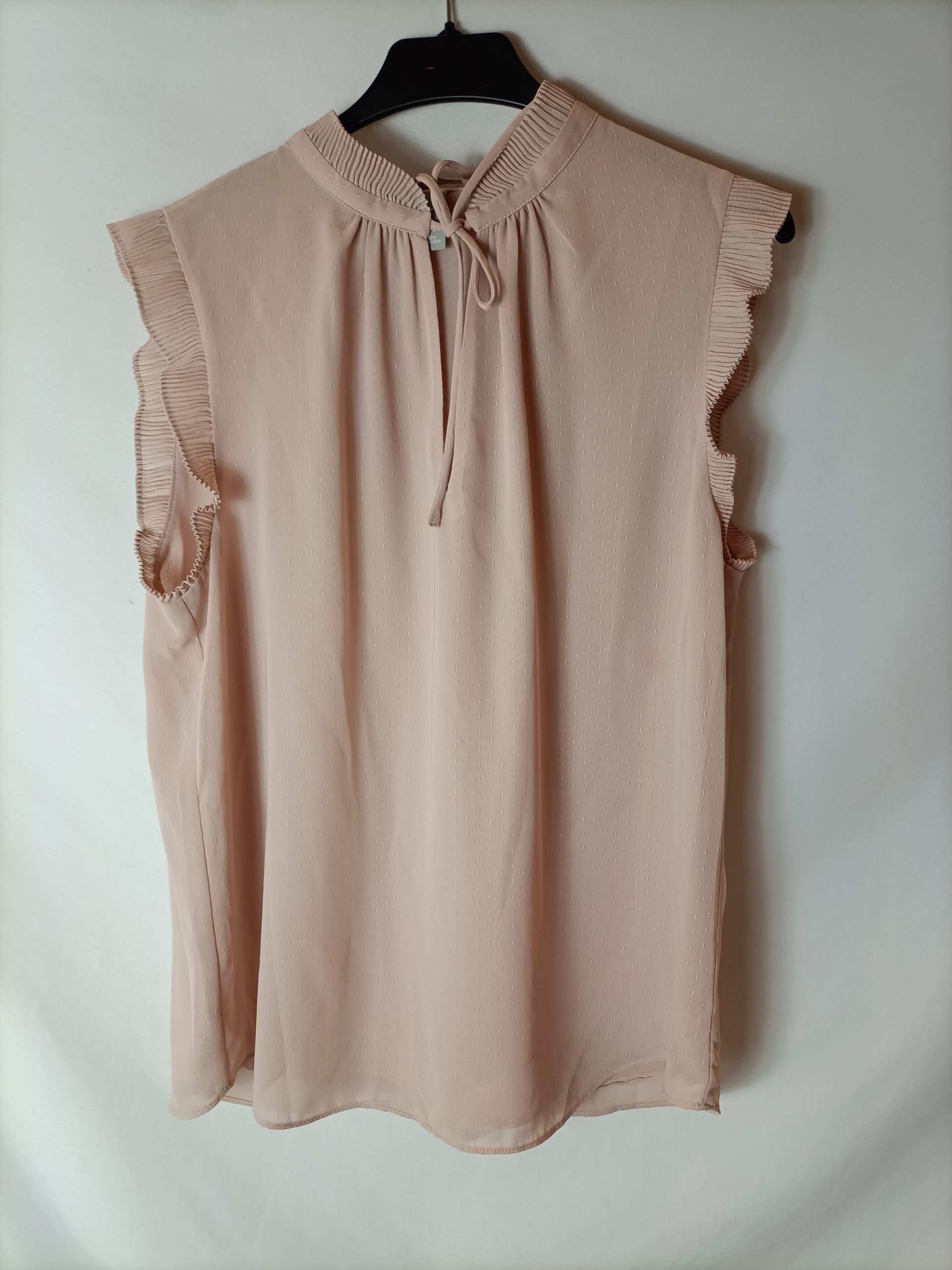 H&M. Blusa rosa plumeti T.40