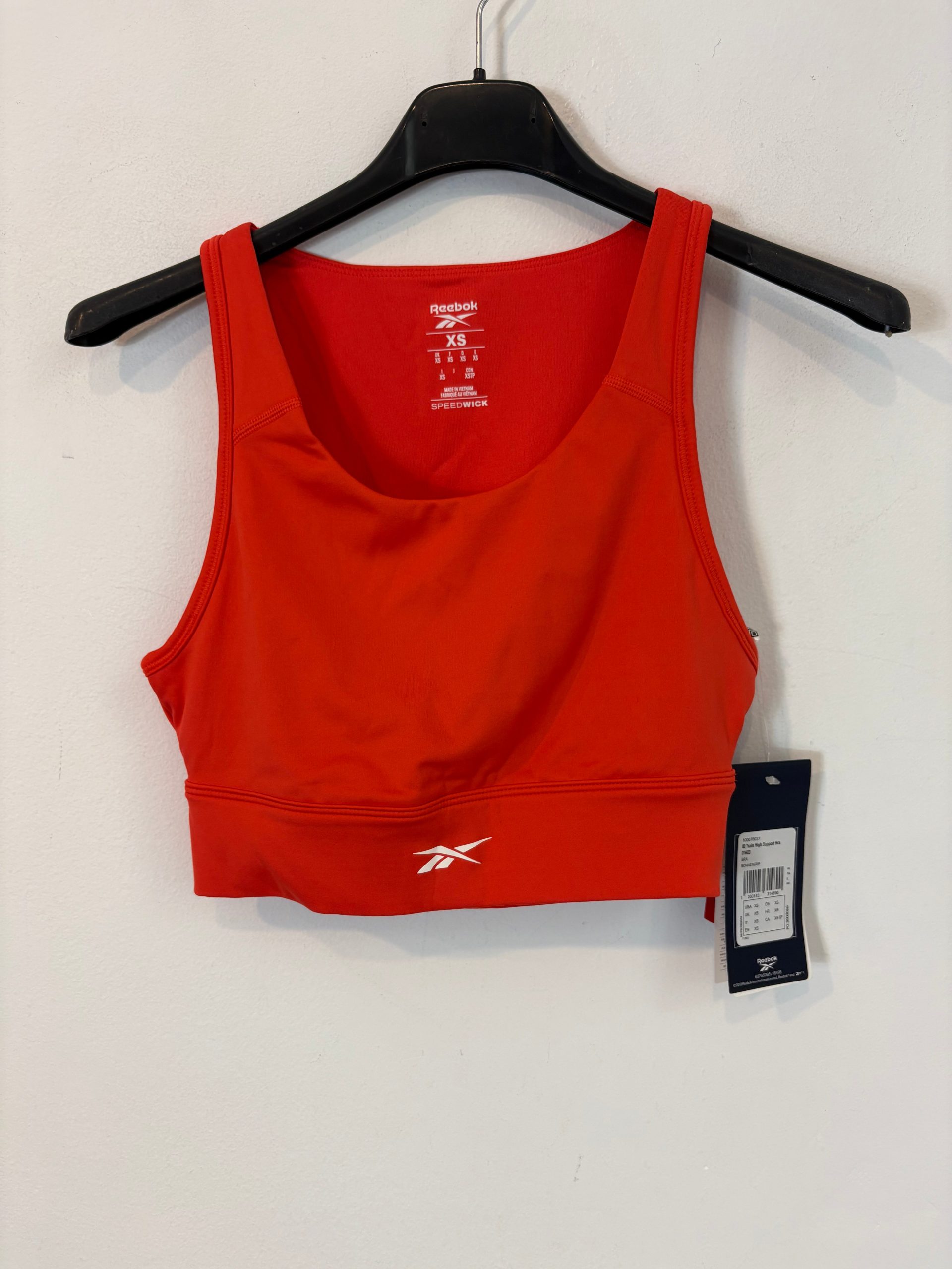 REEBOK. Top deportivo rojo. T XS