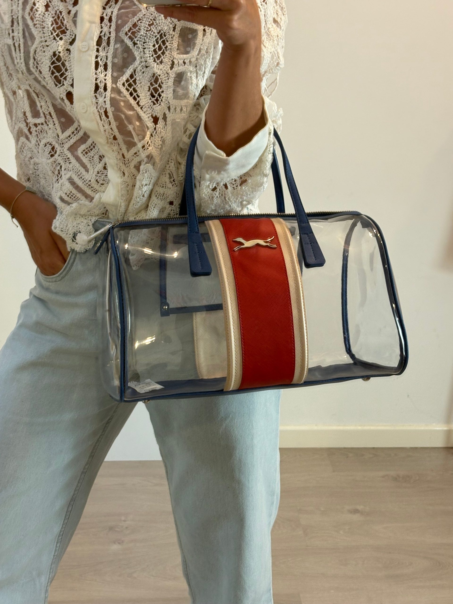 BIMBA Y LOLA. Bolso de mano transparente