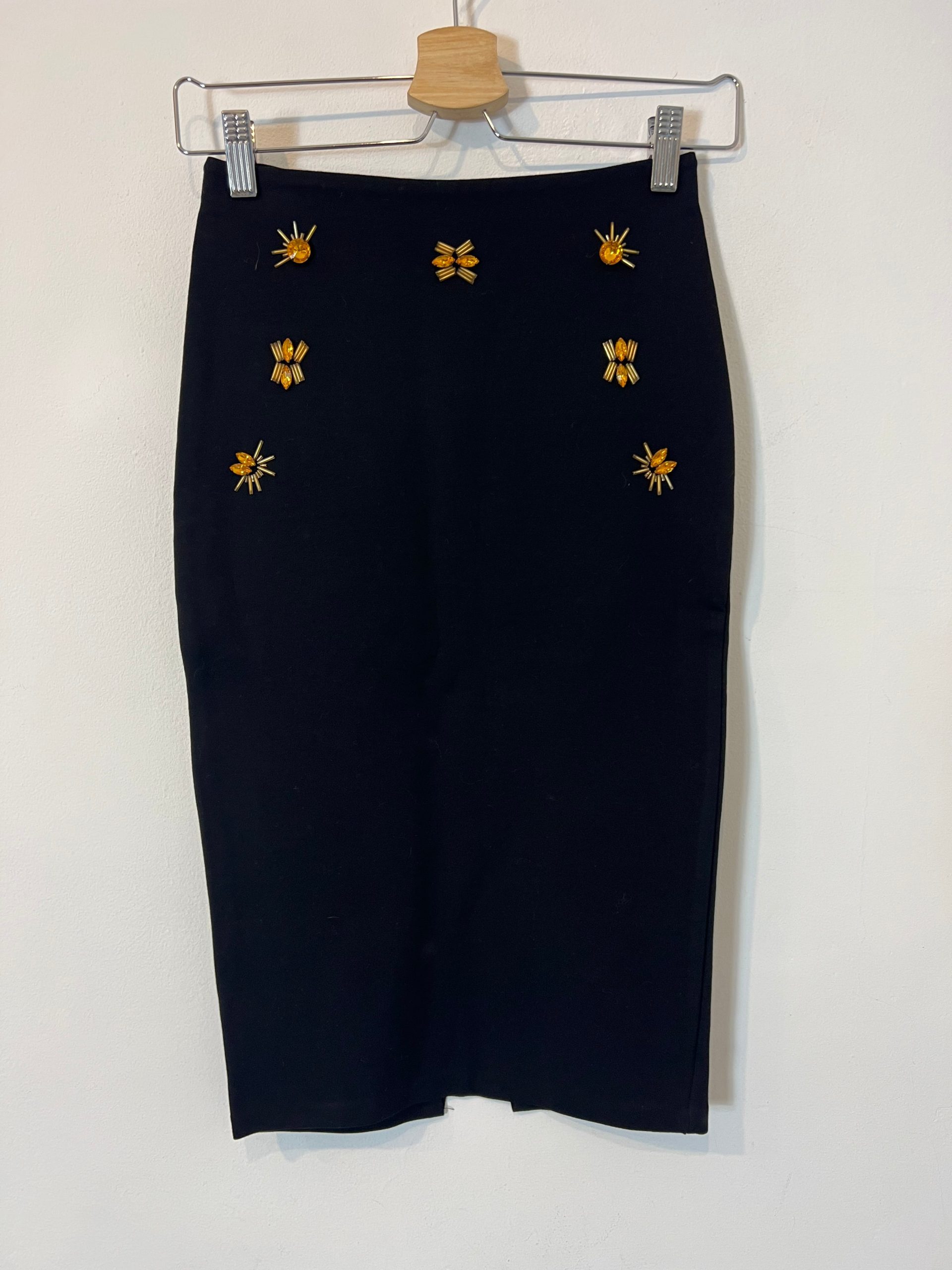 H&M. Falda tubo elástica abalorios. T XS