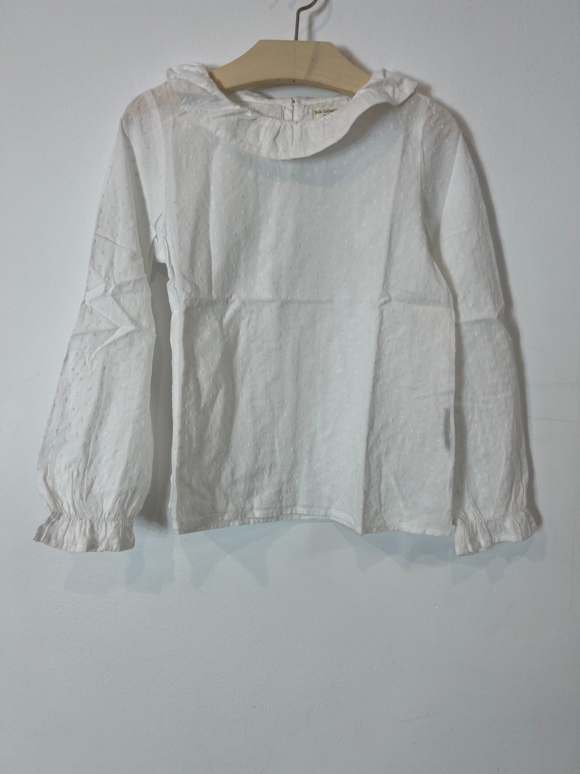 UNIT. Blusa blanca plumeti. T 6/7 años