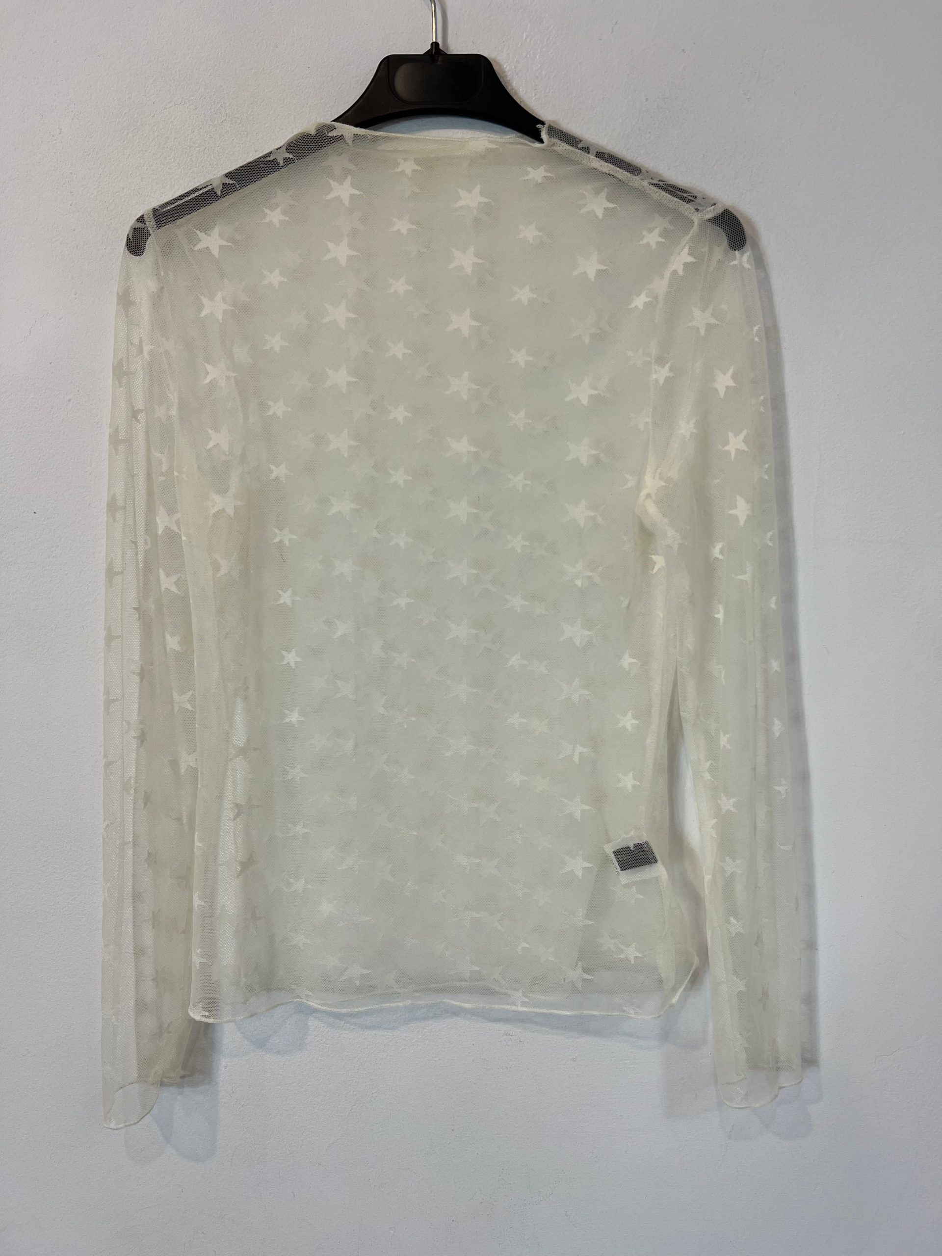 IN VOGUE.Top rejilla estrellas T.s