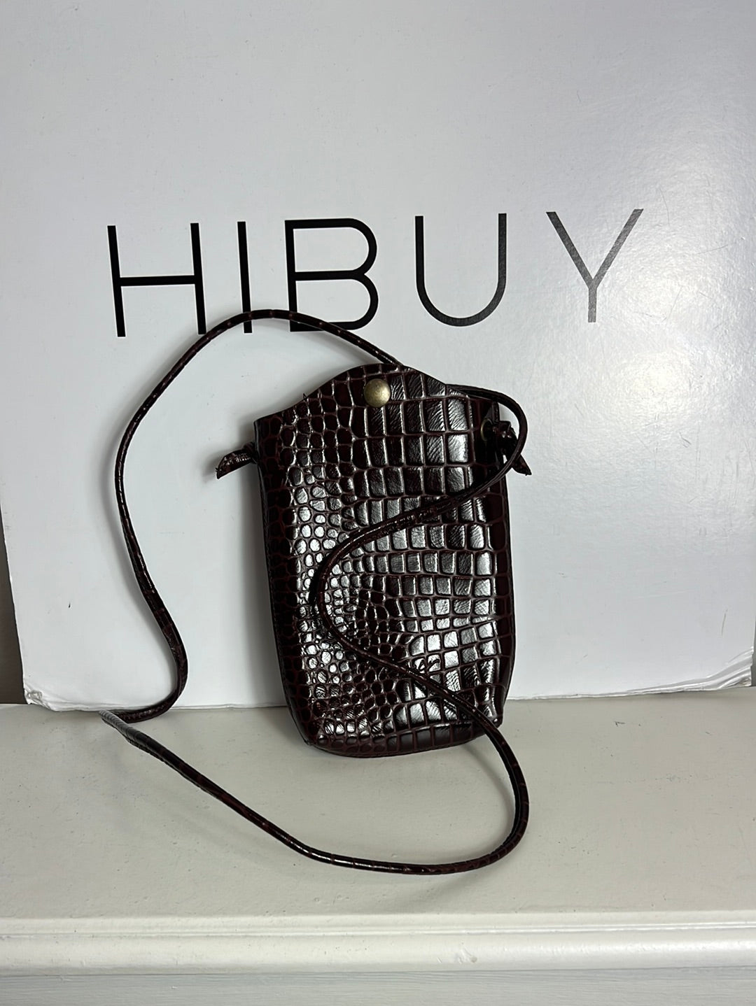 OTRAS. Bolso mini piel troquelada