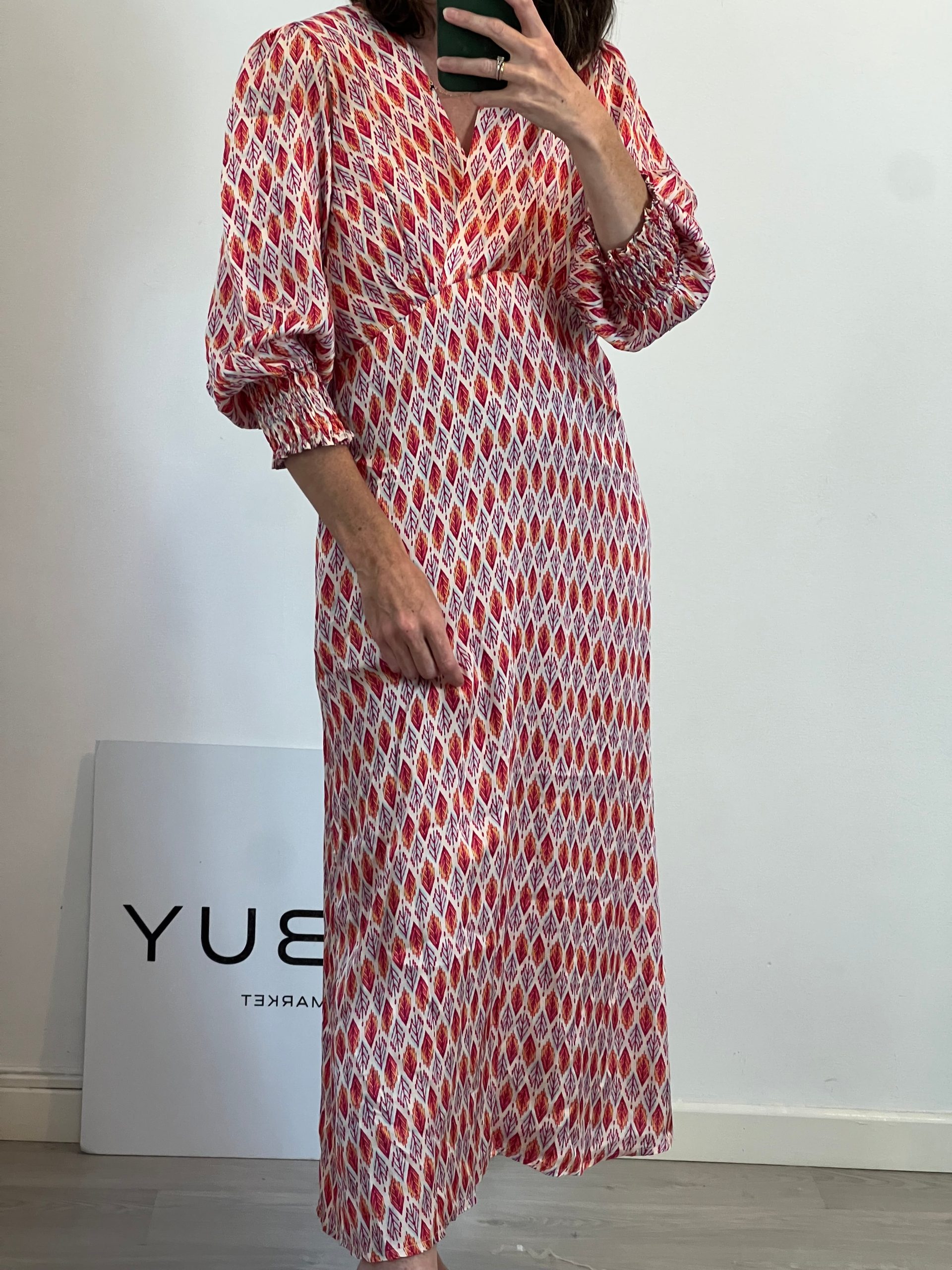 MUSCARI. Vestido beige flechas T. (s/m)