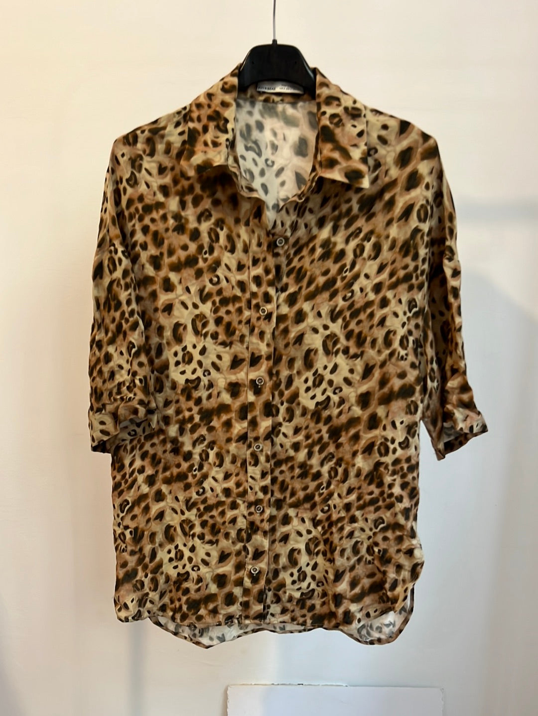 H&M. Blusa animal print manga corta. T S