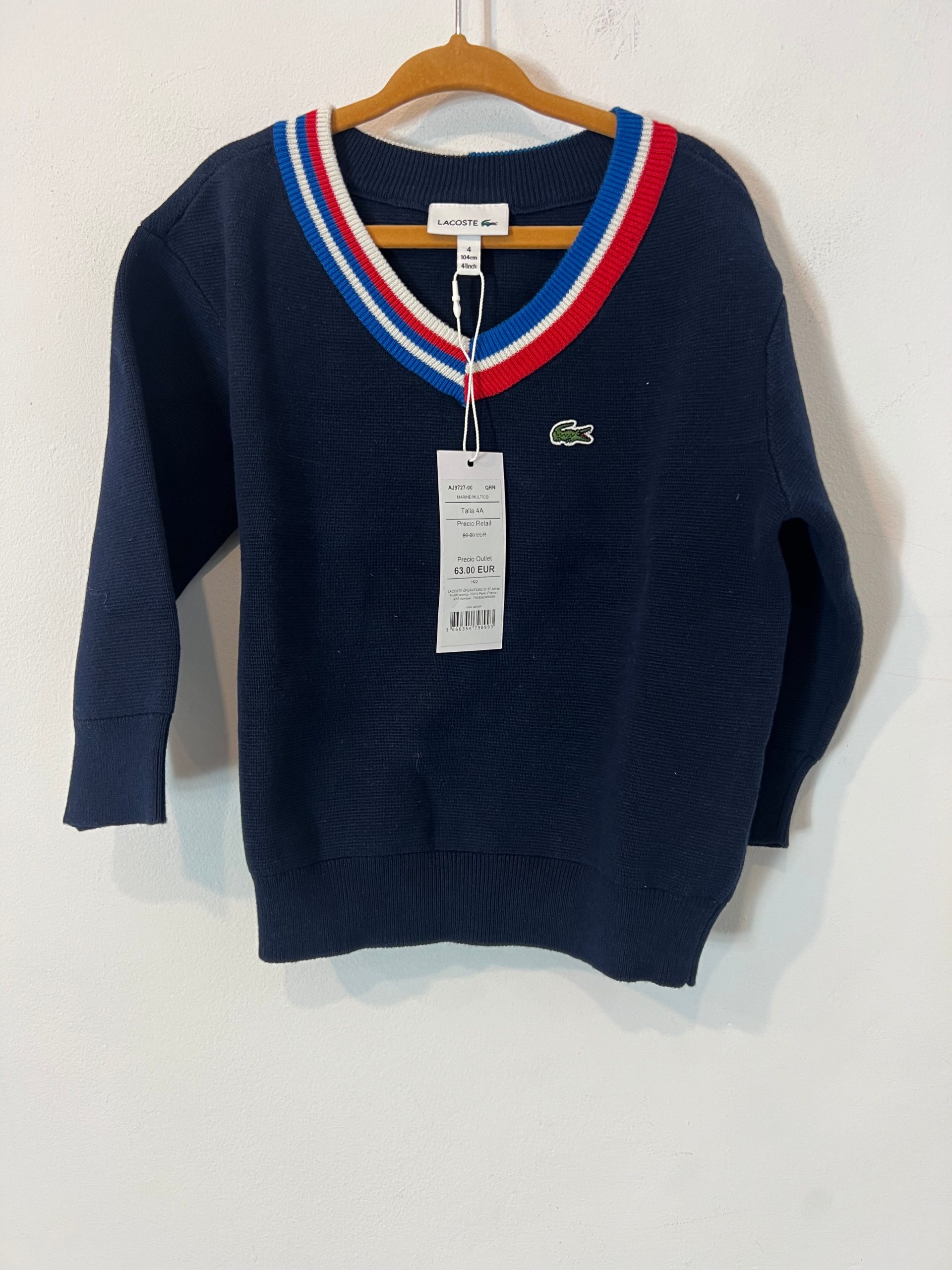 LACOSTE. Jersey azul cuello pico. T 4 años