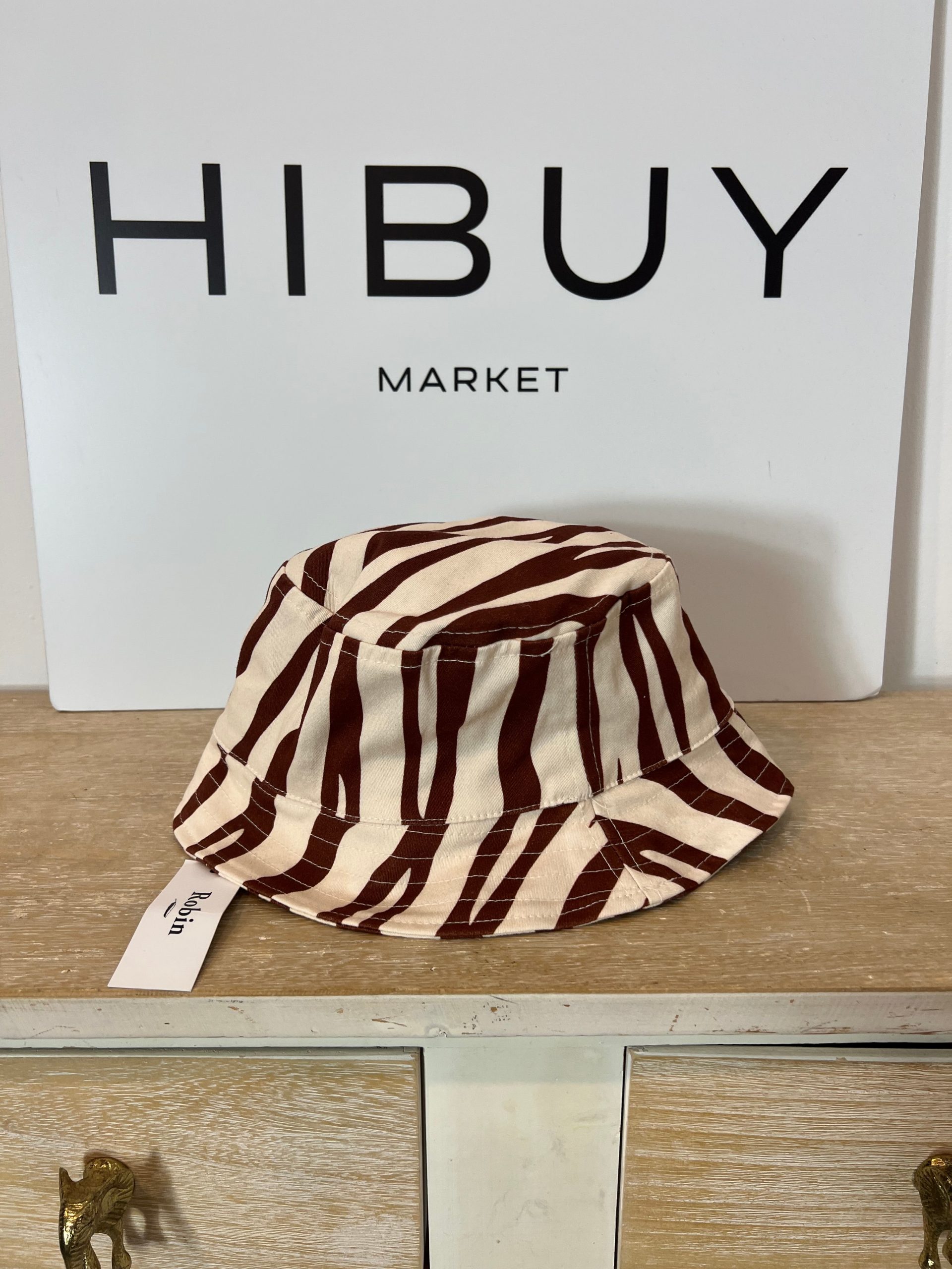 ROBIN. Bucket marrón y beige Tu