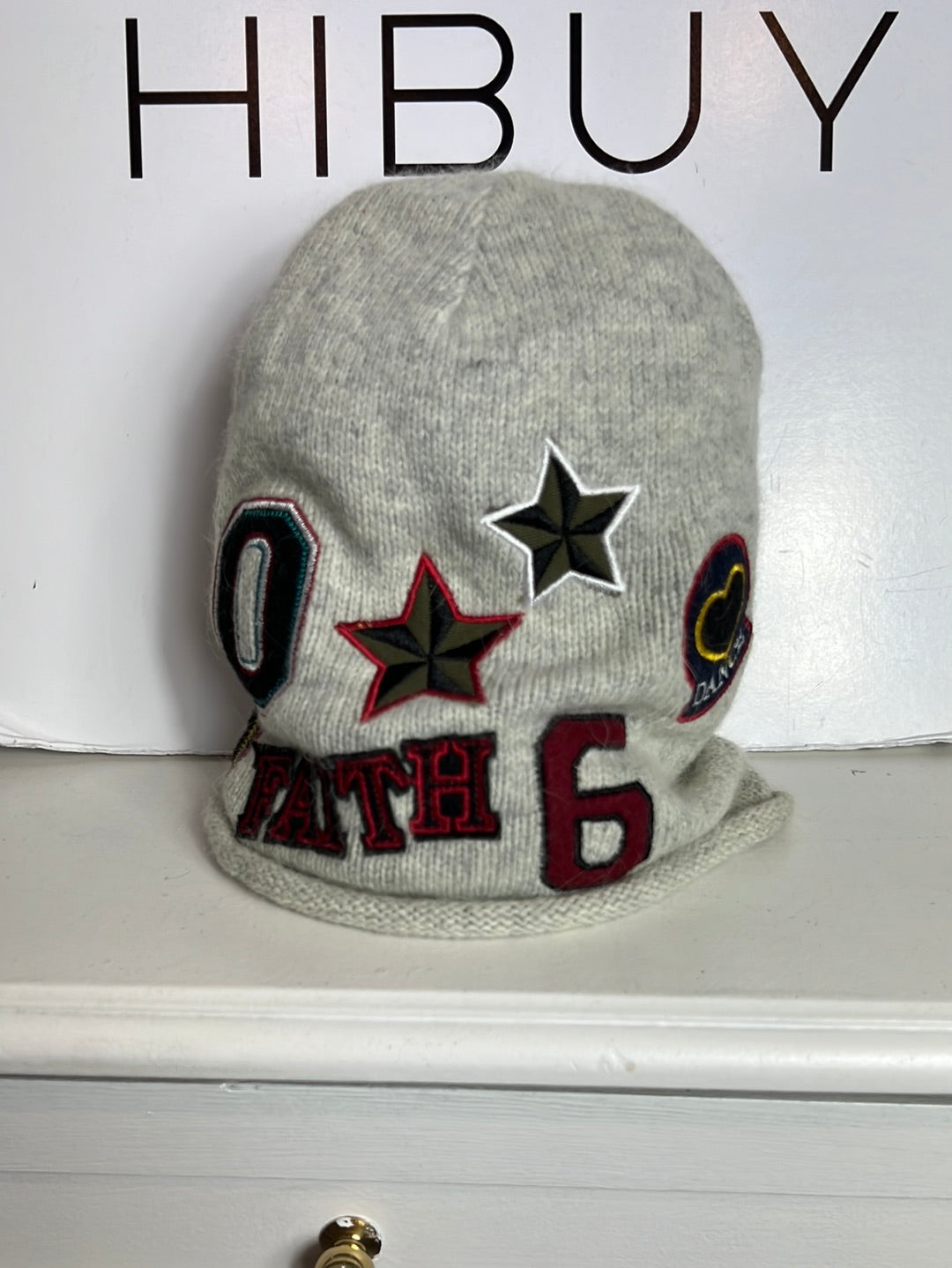 H&M. Gorro gris parches . TU