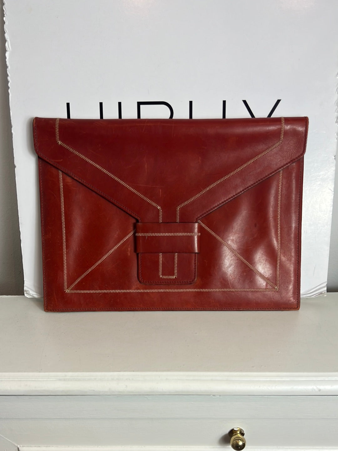 CHANTAL DE VASSIEU. Cartera de mano piel marrón