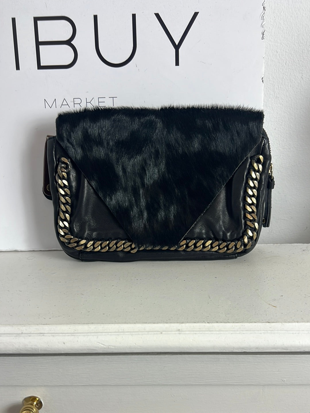 INTROPIA. Bolso de mano piel doble textura