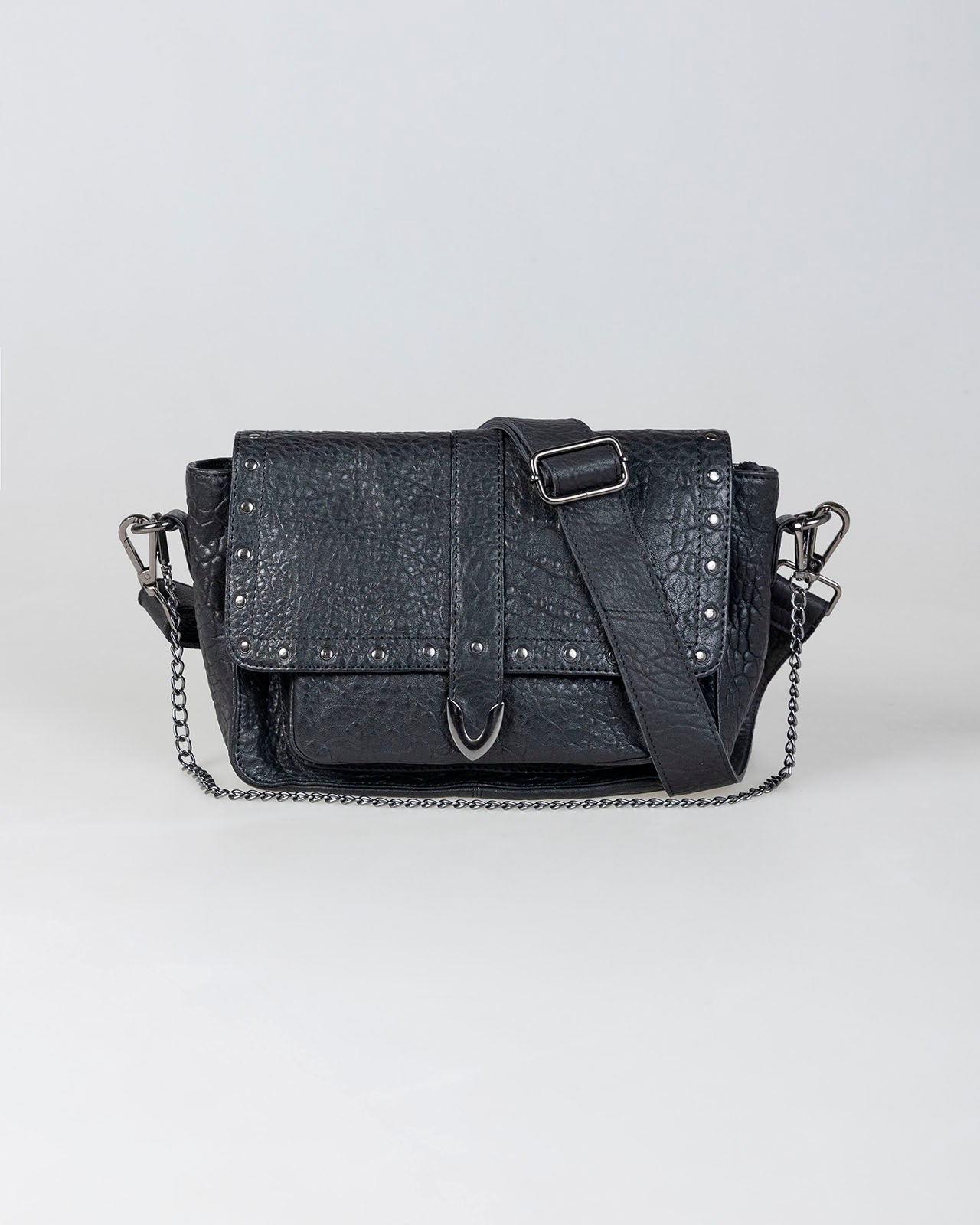 Bolso piel con tachas