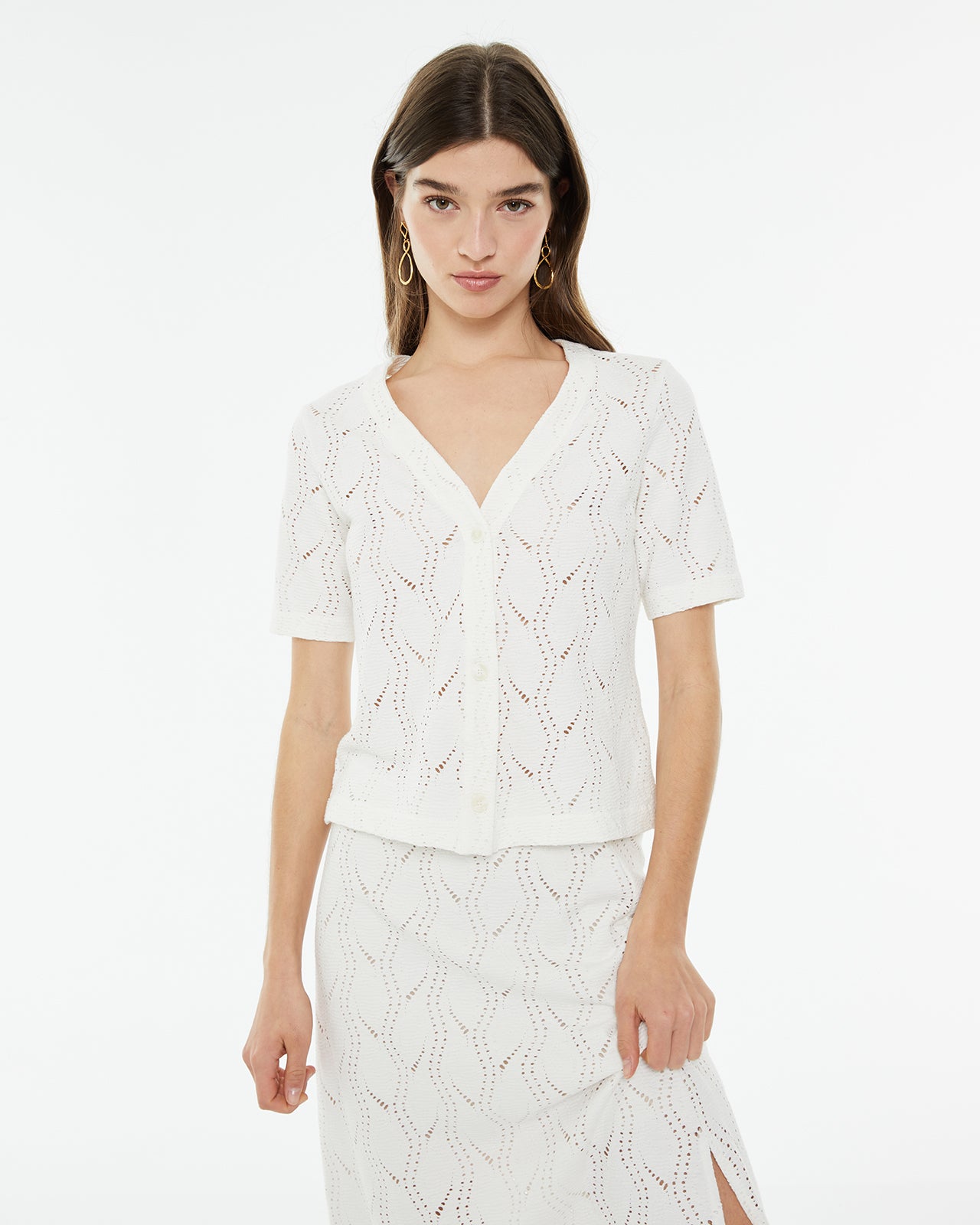 Camiseta calada de manga corta con botones delanteros