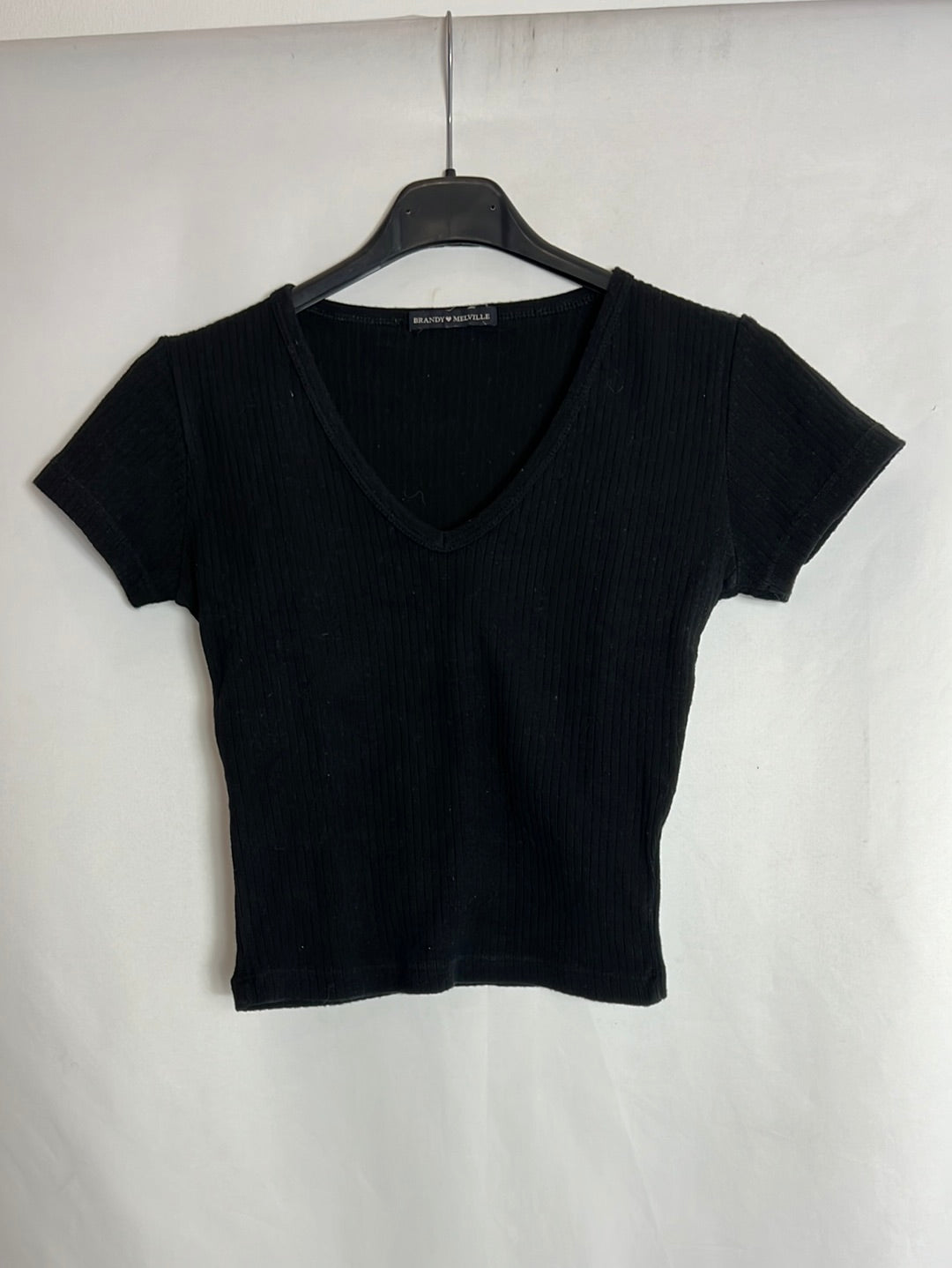 BRANDY MELVILLE. Camiseta crop canalé negra. T XS