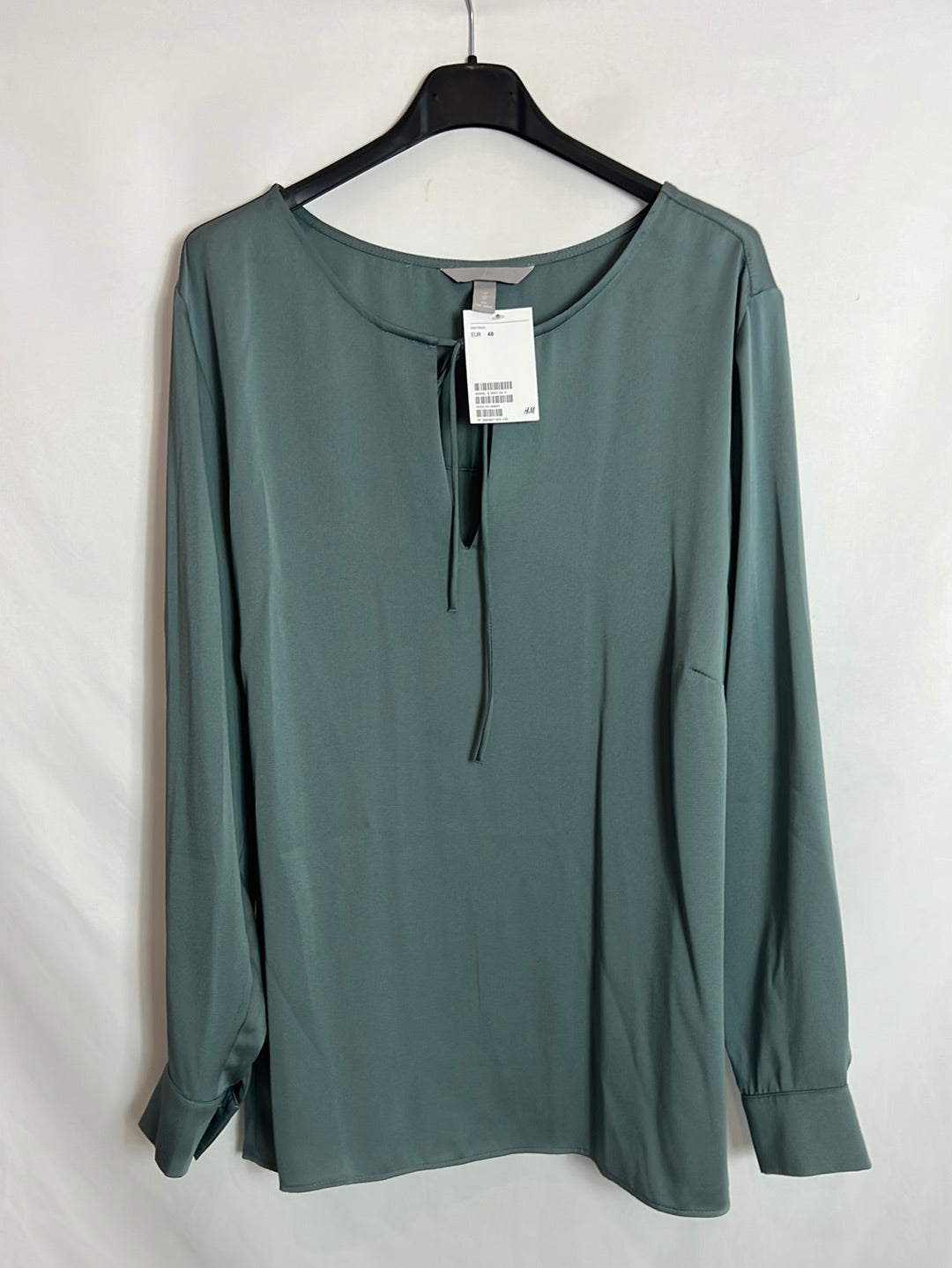 H&M. Blusa verde agua satinada. T 48