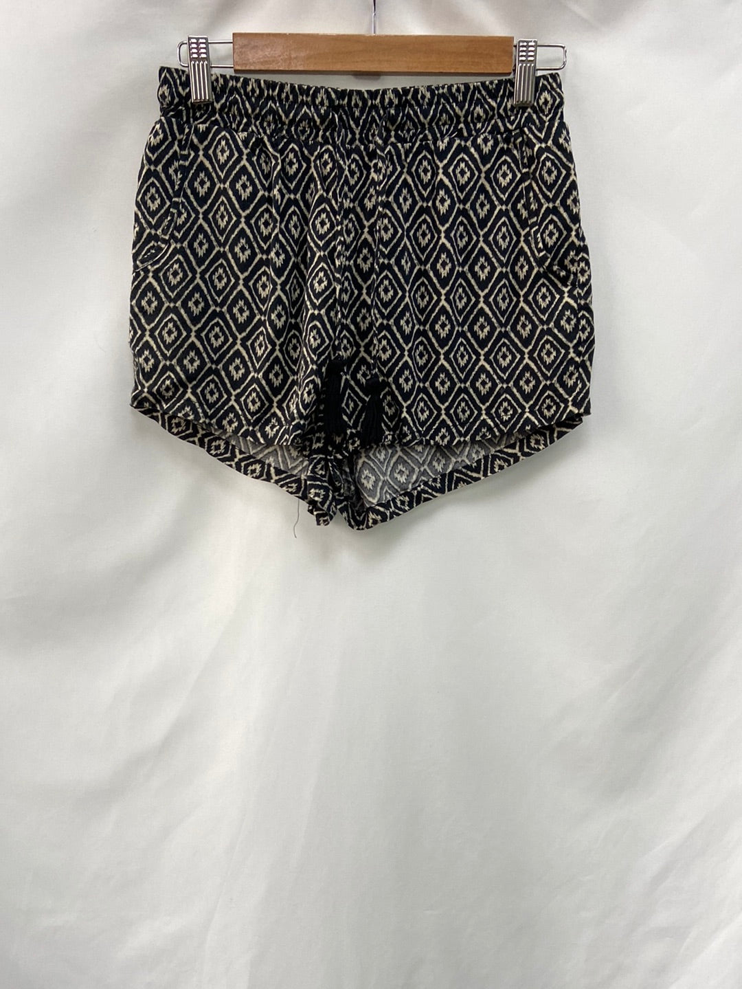 PRIMARK.Shorts fluidos T.38