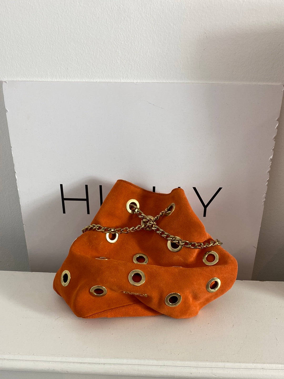 CUPLÉ. Bolso piel naranjas