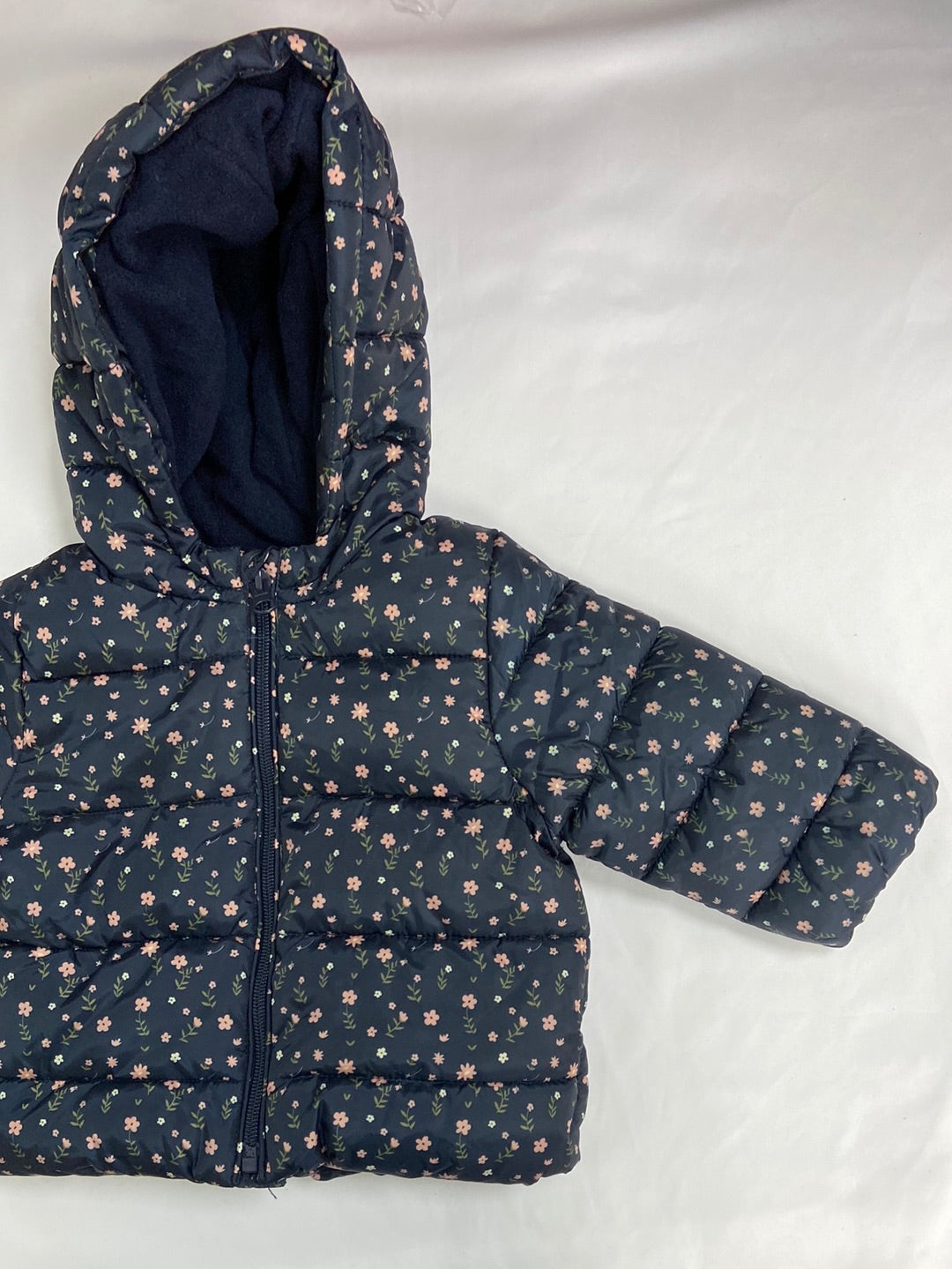 KIABI.Plumas flores 9 meses