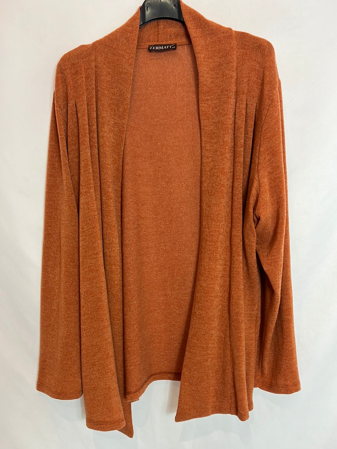 ZERMATI. Cárdigan punto color caldera. T 48