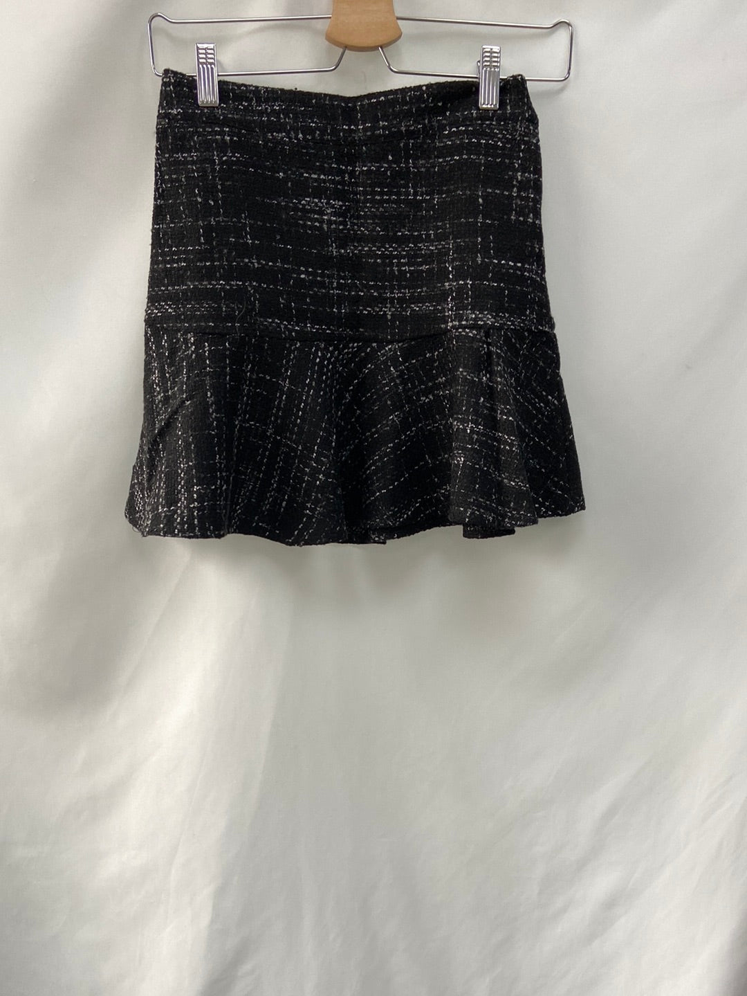 LEFTIES.Falda jaspeada volante T.XS