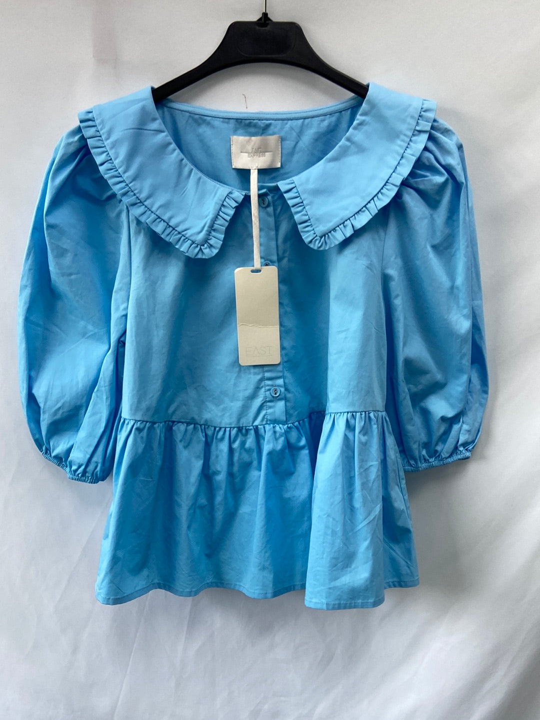 EAST EXPRESS.Top azul cielo cuello bebé T.S