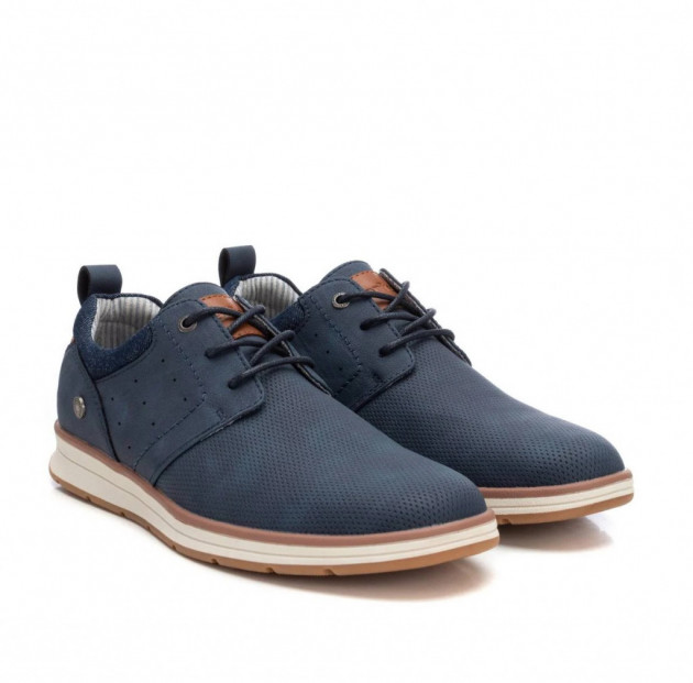Zapatos casuales azules picados y económicos